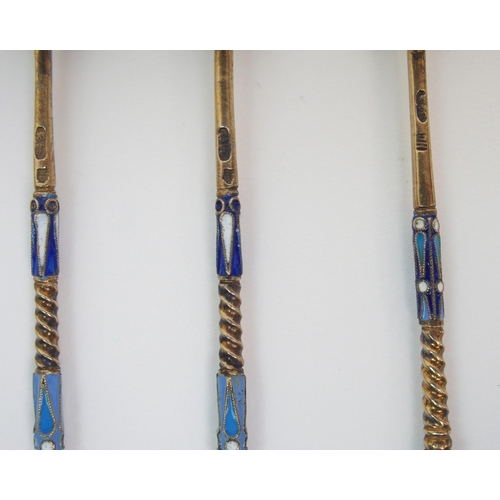 188 - A SET OF FIVE RUSSIAN SILVER GILT AND ENAMEL SPOONS