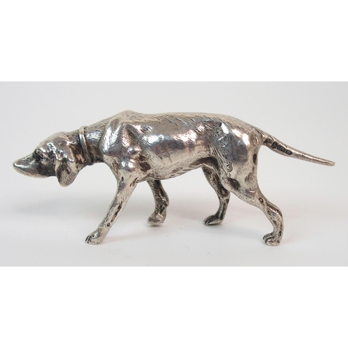 195 - A CONTINENTAL SILVER MODEL OF A DOG