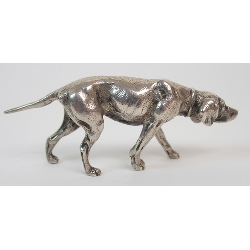 195 - A CONTINENTAL SILVER MODEL OF A DOG