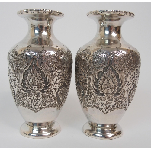 196 - A PAIR OF CONTINENTAL WHITE-METAL BALUSTER VASES