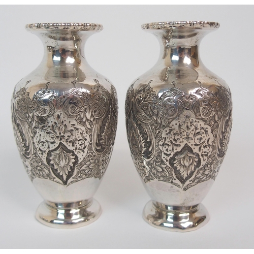 196 - A PAIR OF CONTINENTAL WHITE-METAL BALUSTER VASES