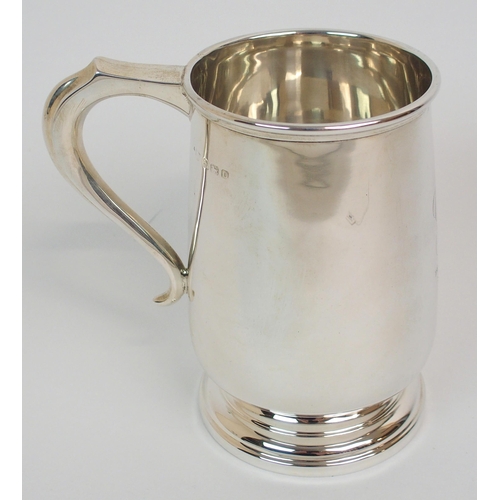 200 - A SILVER TANKARD