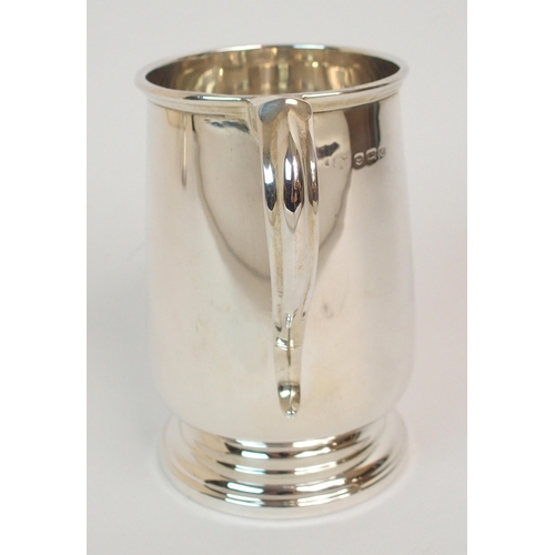 200 - A SILVER TANKARD