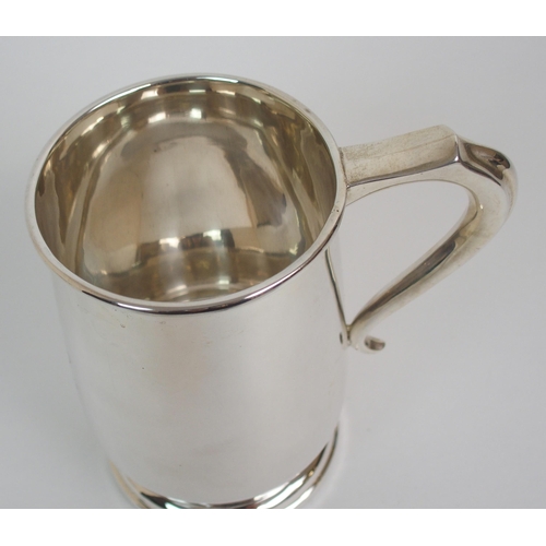 200 - A SILVER TANKARD