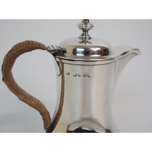 204 - A SILVER HOT MILK POT