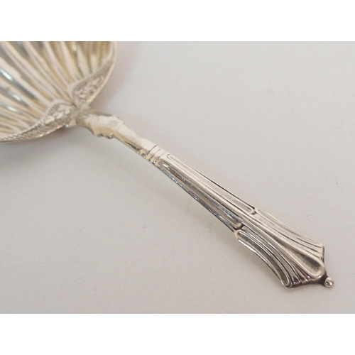 209 - A SILVER CADDY SPOON