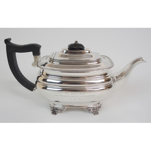 211 - A SILVER THREE-PIECE TEA SERVICE