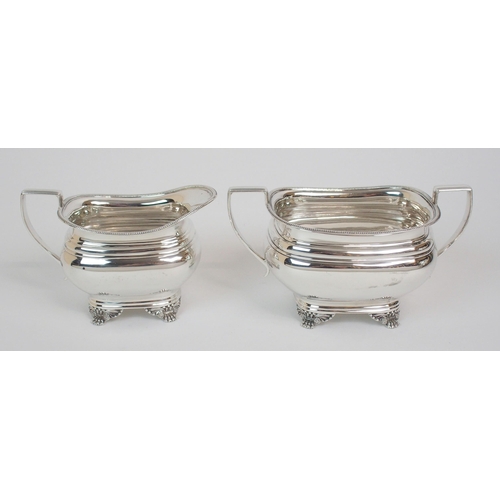 211 - A SILVER THREE-PIECE TEA SERVICE