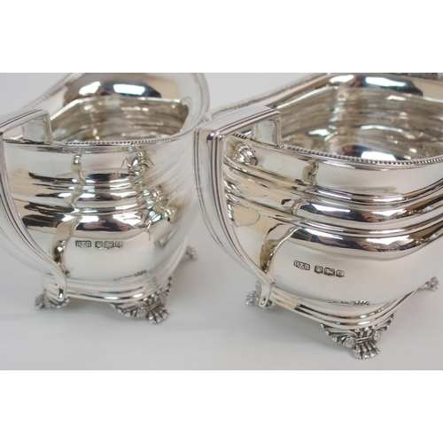 211 - A SILVER THREE-PIECE TEA SERVICE