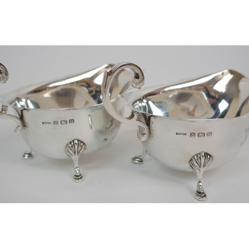 213 - A PAIR OF SILVER SAUCE BOATS