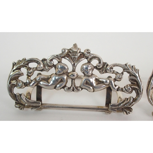 214 - A CASED SET OF FOUR SILVER MENU HOLDERS