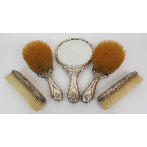 218 - A MATCHED FIVE PIECE ART NOUVEAU SILVER-MOUNTED DRESSING TABLE SET