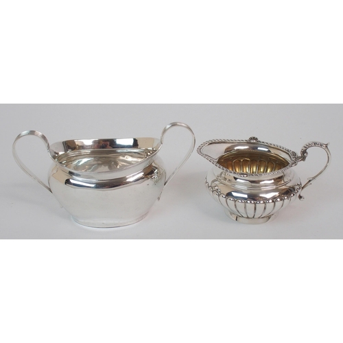 219 - A SILVER CREAM JUG