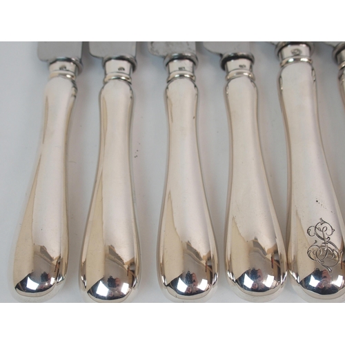 222 - A SET OF NINE RUSSIAN SILVER-HANDLED DINNER KNIVES