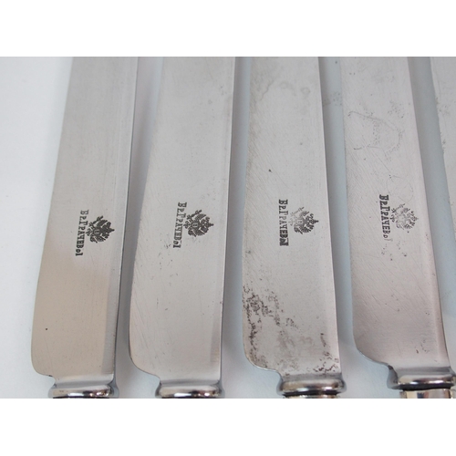 222 - A SET OF NINE RUSSIAN SILVER-HANDLED DINNER KNIVES