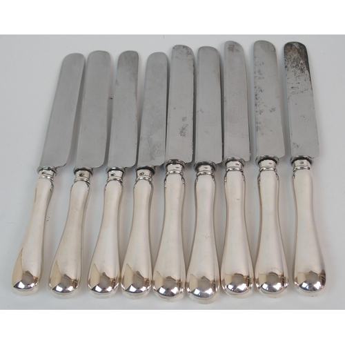 222 - A SET OF NINE RUSSIAN SILVER-HANDLED DINNER KNIVES