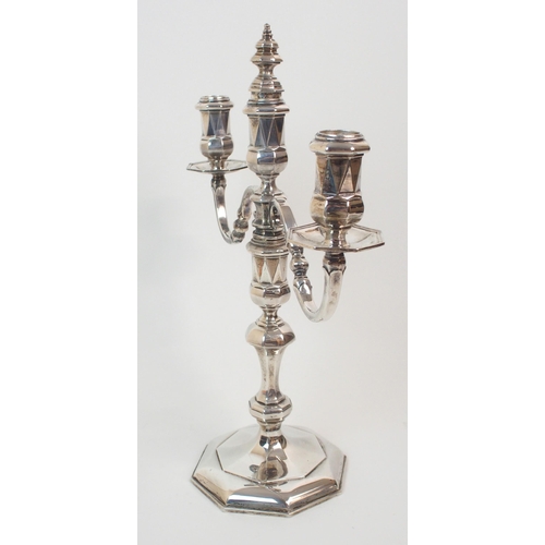 227 - A SILVER TWO-BRANCH CANDELABRUM