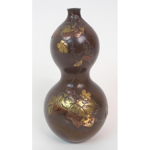 28 - A JAPANESE BRONZE DOUBLE GOURD VASE