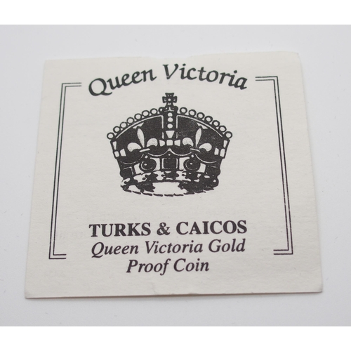 306 - A WESTMINSTER TURKS & CAICOS QUEEN VICTORIA GOLD PROOF 100 CROWNS COIN