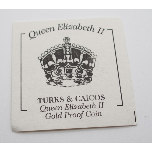 307 - A WESTMINSTER TURKS & CAICOS QUEEN ELIZABETH II GOLD PROOF 100 CROWNS COIN