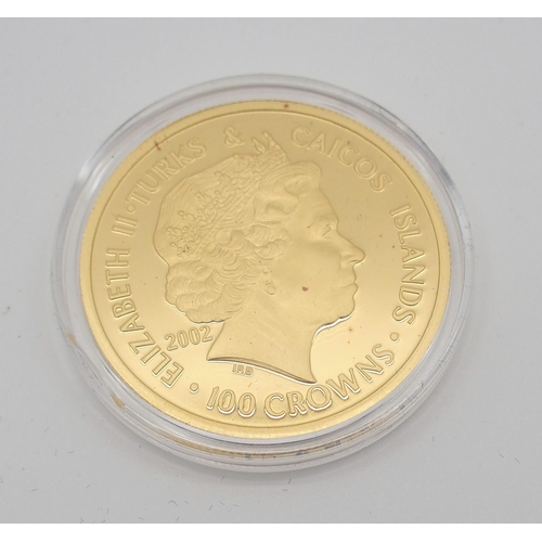 308 - A WESTMINSTER TURKS & CAICOS QUEEN ELIZABETH GOLD PROOF 100 CROWNS COIN