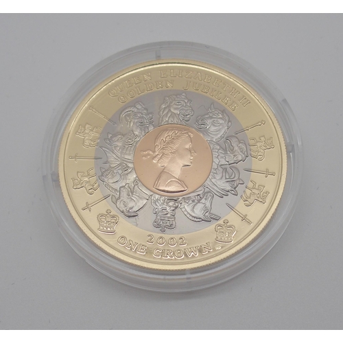 310 - A POBJOY MINT 18CT TRI-GOLD GOLDEN JUBILEE COIN  2002