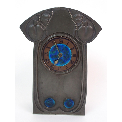 558 - AN ARCHIBALD KNOX PEWTER MANTLE CLOCK