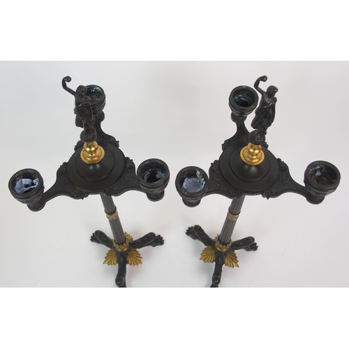 565 - A PAIR OF CAST BRONZE CANDELABRA