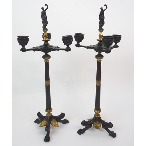 565 - A PAIR OF CAST BRONZE CANDELABRA