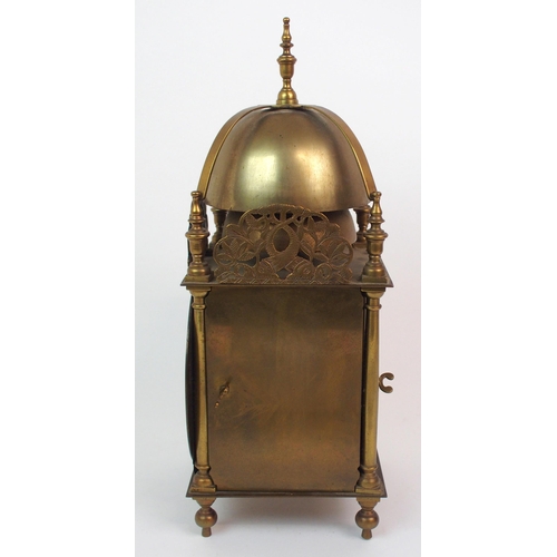 568 - A BRASS LANTERN CLOCK