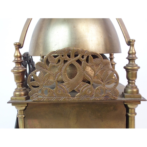 568 - A BRASS LANTERN CLOCK