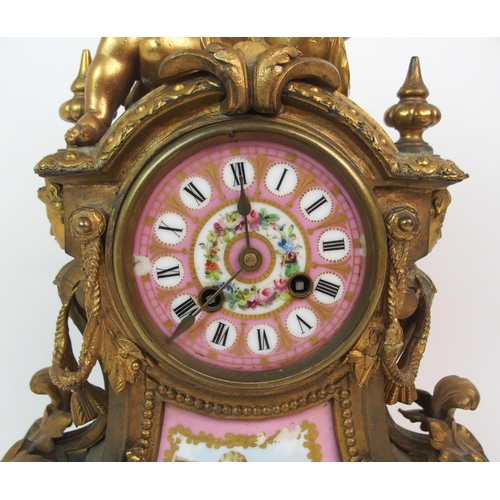 588 - A LATE 19TH CENTURY FRENCH ORMOLU AND PORCELAIN MOUNTED MANTEL CLOCK