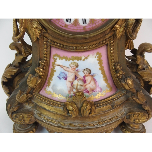 588 - A LATE 19TH CENTURY FRENCH ORMOLU AND PORCELAIN MOUNTED MANTEL CLOCK