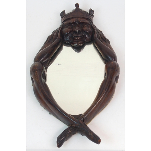 589 - A 19TH CENTURY CARVED WOOD FIGURAL MIRROR