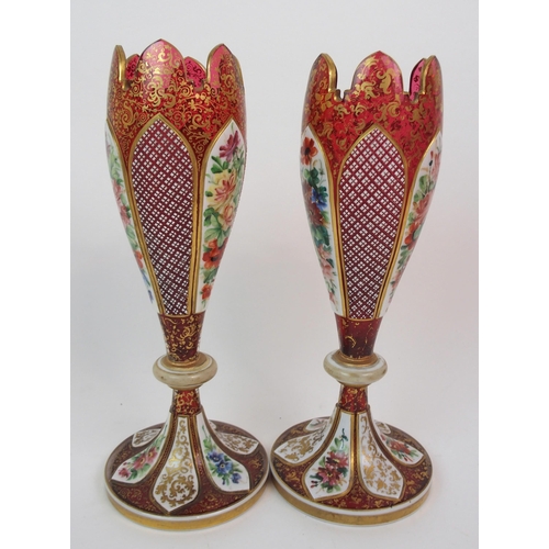 592 - A PAIR OF 19TH CENTURY BOHEMIAN CRANBERRY GLASS VASES