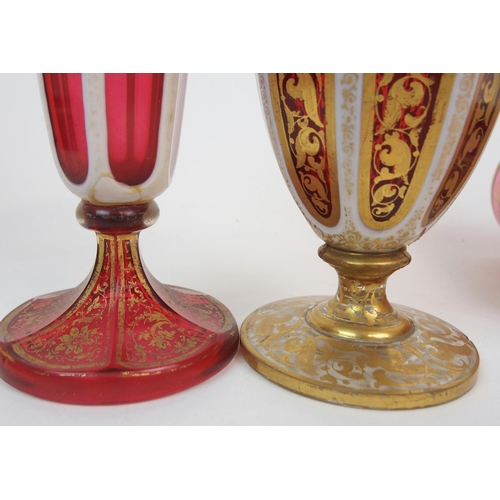 592 - A PAIR OF 19TH CENTURY BOHEMIAN CRANBERRY GLASS VASES