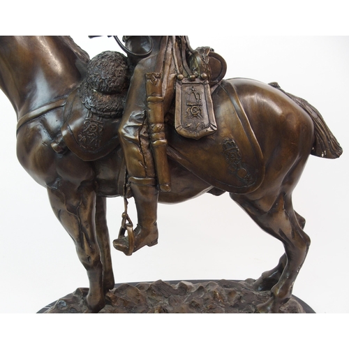 594 - AFTER JOHN SKEAPING -  A BRONZE OF A PRUSSIAN HUSSAR