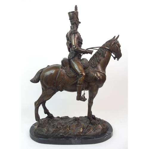 594 - AFTER JOHN SKEAPING -  A BRONZE OF A PRUSSIAN HUSSAR