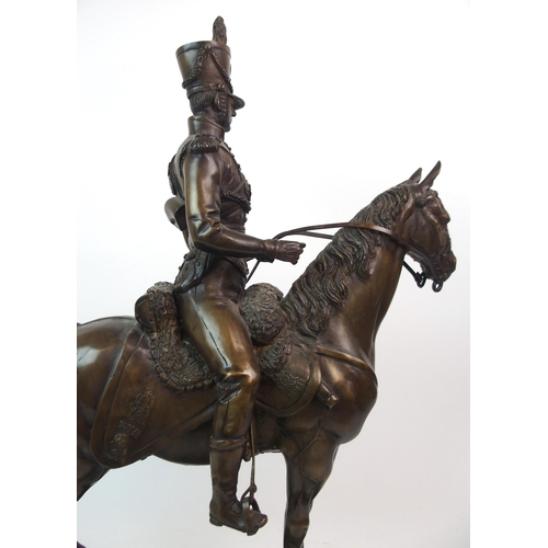 594 - AFTER JOHN SKEAPING -  A BRONZE OF A PRUSSIAN HUSSAR