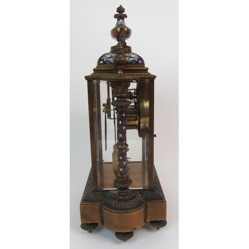 607 - A FRENCH CHAMPLEVE ENAMEL  BRASS AND GLASS MANTLE CLOCK