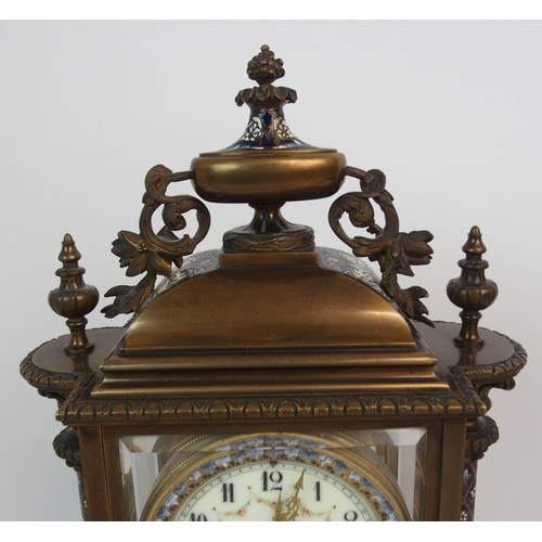 607 - A FRENCH CHAMPLEVE ENAMEL  BRASS AND GLASS MANTLE CLOCK