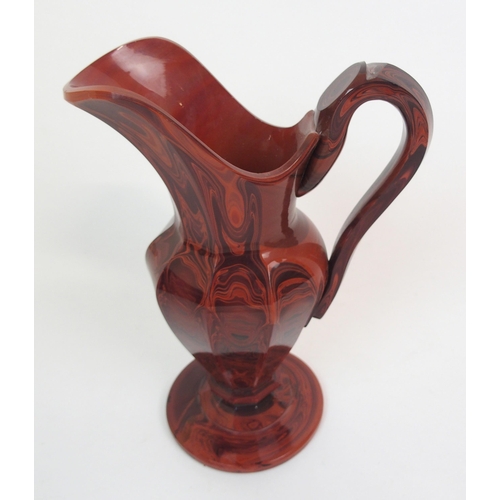 608 - A SCOTTISH AGATE GLASS FACETED BALUSTER JUG