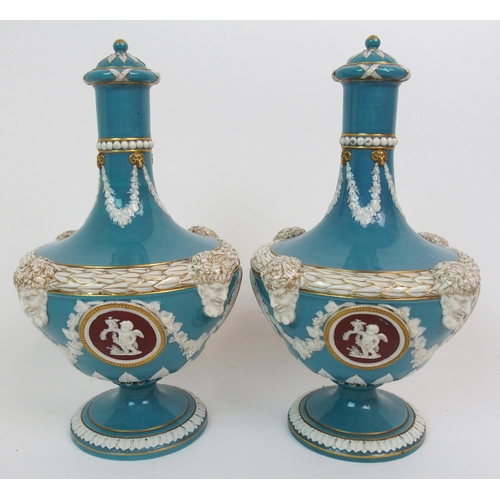 610 - A PAIR OF WEDGWOOD TRI-COLOUR 'BARBER BOTTLE VASES'