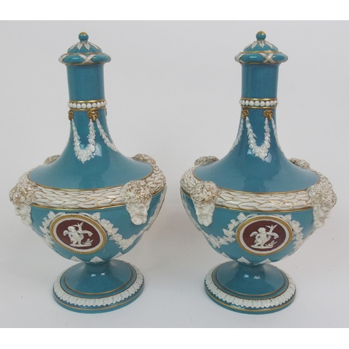 610 - A PAIR OF WEDGWOOD TRI-COLOUR 'BARBER BOTTLE VASES'