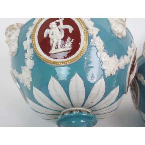 610 - A PAIR OF WEDGWOOD TRI-COLOUR 'BARBER BOTTLE VASES'