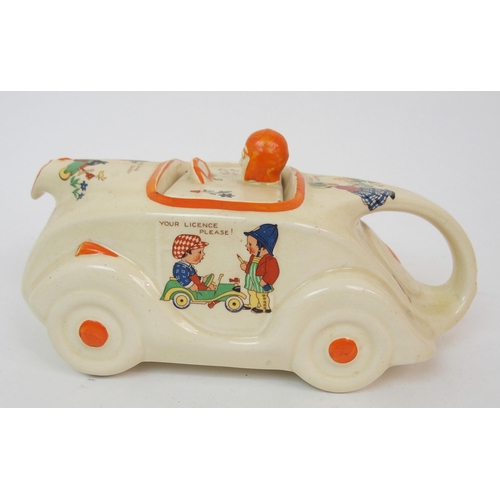 612 - A SADLER POTTERY MABEL LUCIE ATTWELL RACING CAR NURSERY TEAPOT