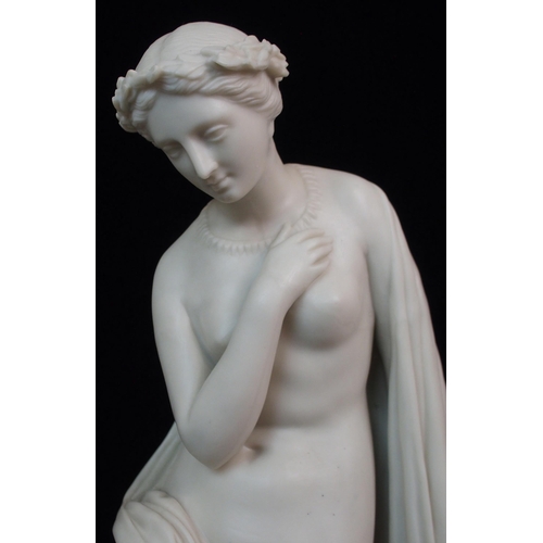 622 - A PARIAN FIGURE OF A SCANTILY CLAD WOMAN