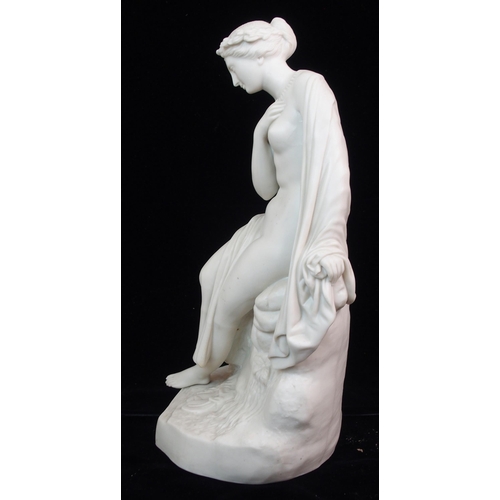 622 - A PARIAN FIGURE OF A SCANTILY CLAD WOMAN