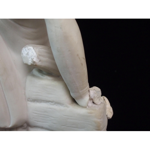 628 - A PARIAN FIGURE OF A WOMAN HOLDING A TAMBOURINE