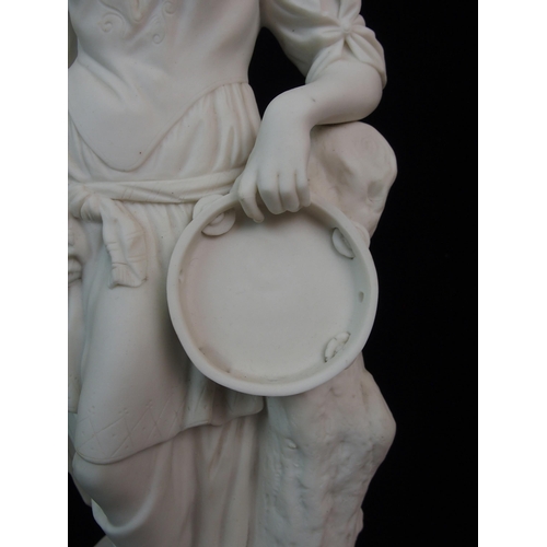 628 - A PARIAN FIGURE OF A WOMAN HOLDING A TAMBOURINE